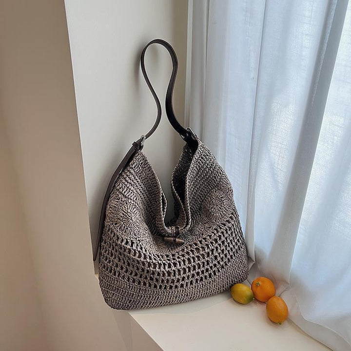 Braided summer handbag with practical leather handles Kalsten