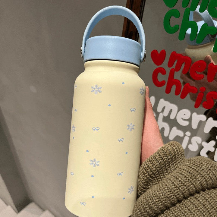 Women's insulated drinking bottle with practical carrying handle and cheerful design Kalsten