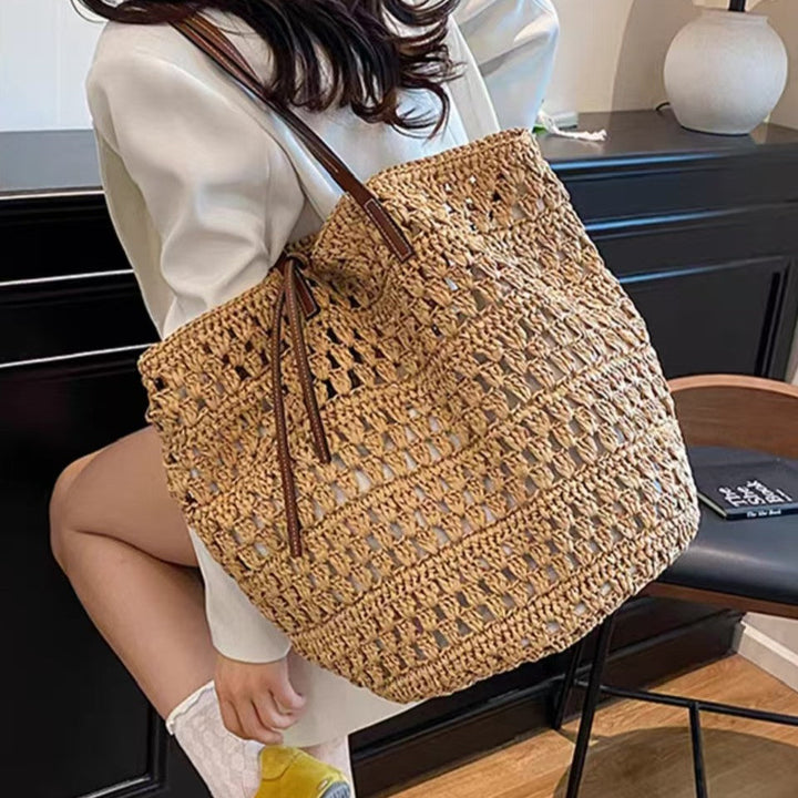 Woven natural material handbag with leather handles Kalsten