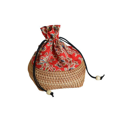 Charming storage bag made of hand-woven rattan Acalora