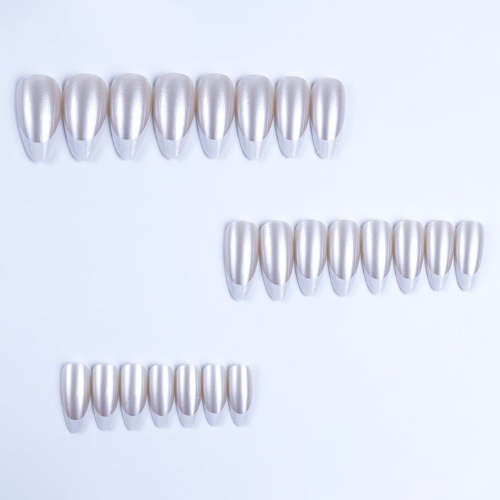Artificial nails in elegant French tip design Kalsten