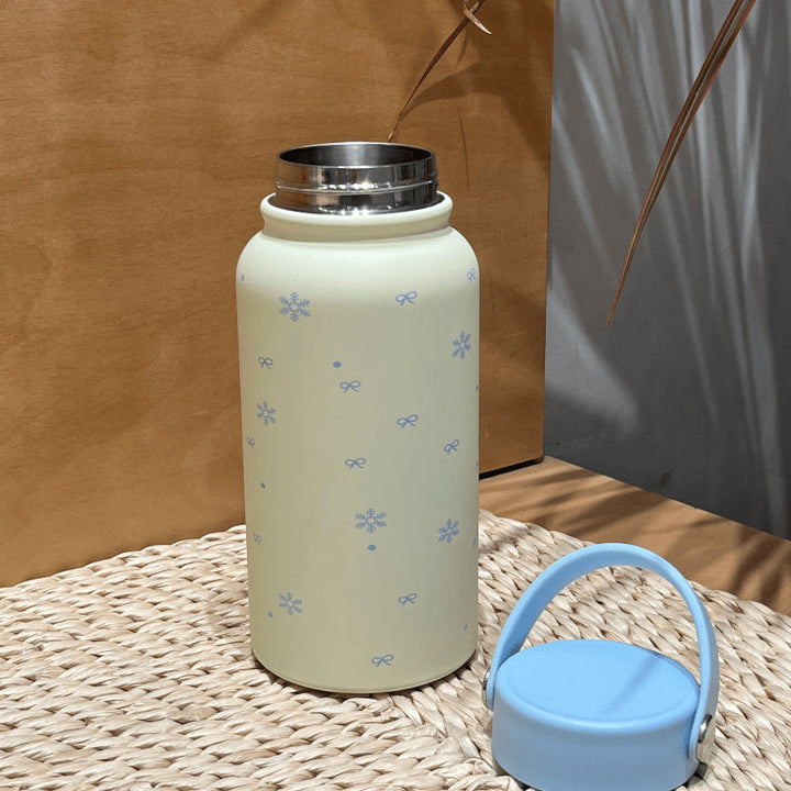 Women's insulated drinking bottle with practical carrying handle and cheerful design Kalsten