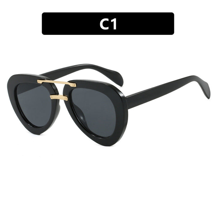 Womens extravagant sunglasses in modern heart design Kalsten
