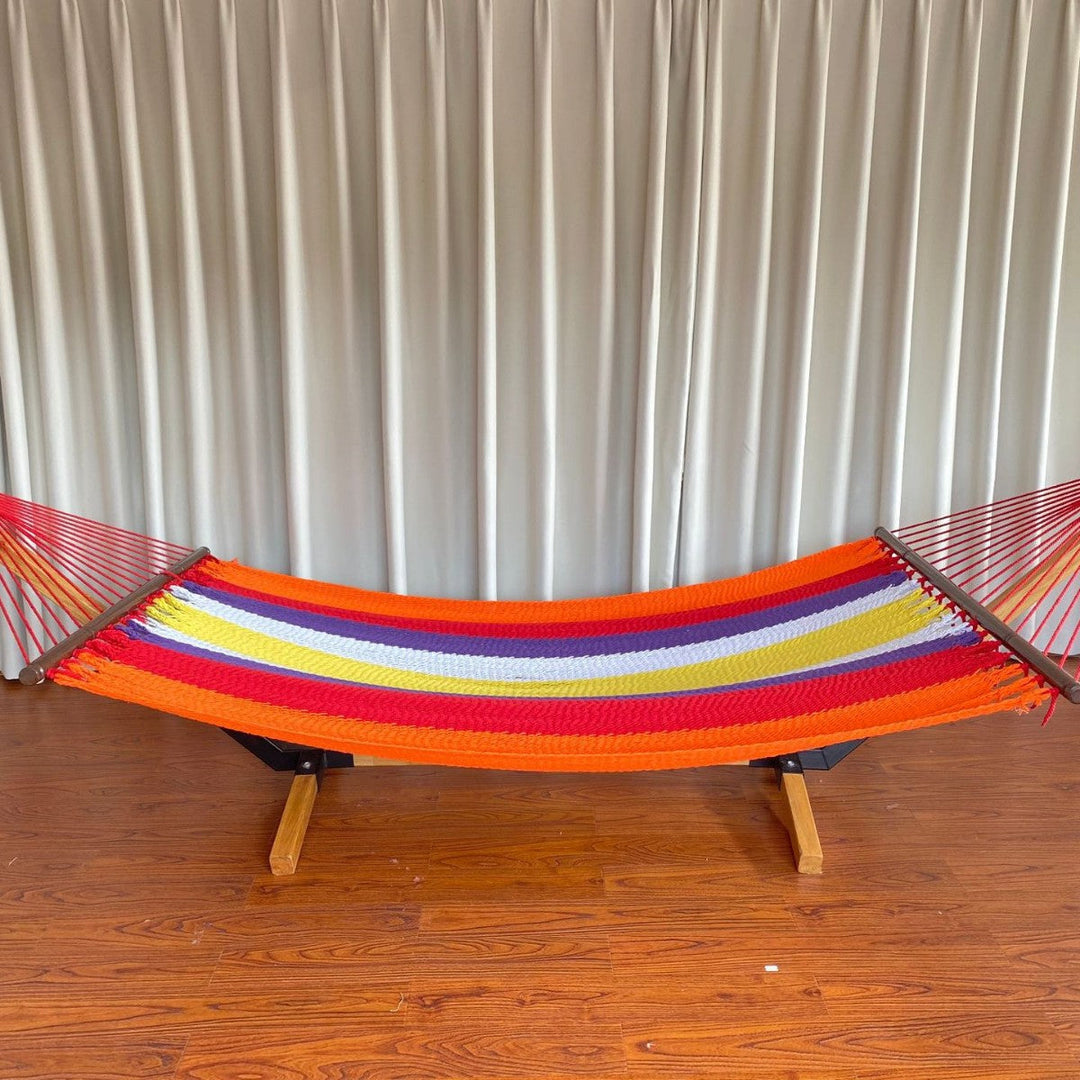 Woven cotton hammock with wooden spreader bars and freestanding stand Kalsten