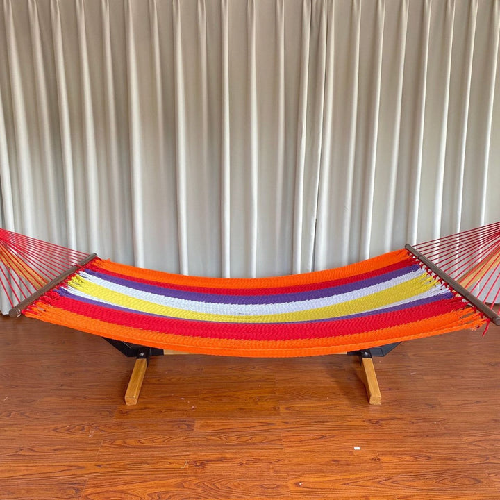 Woven cotton hammock with wooden spreader bars and freestanding stand Kalsten