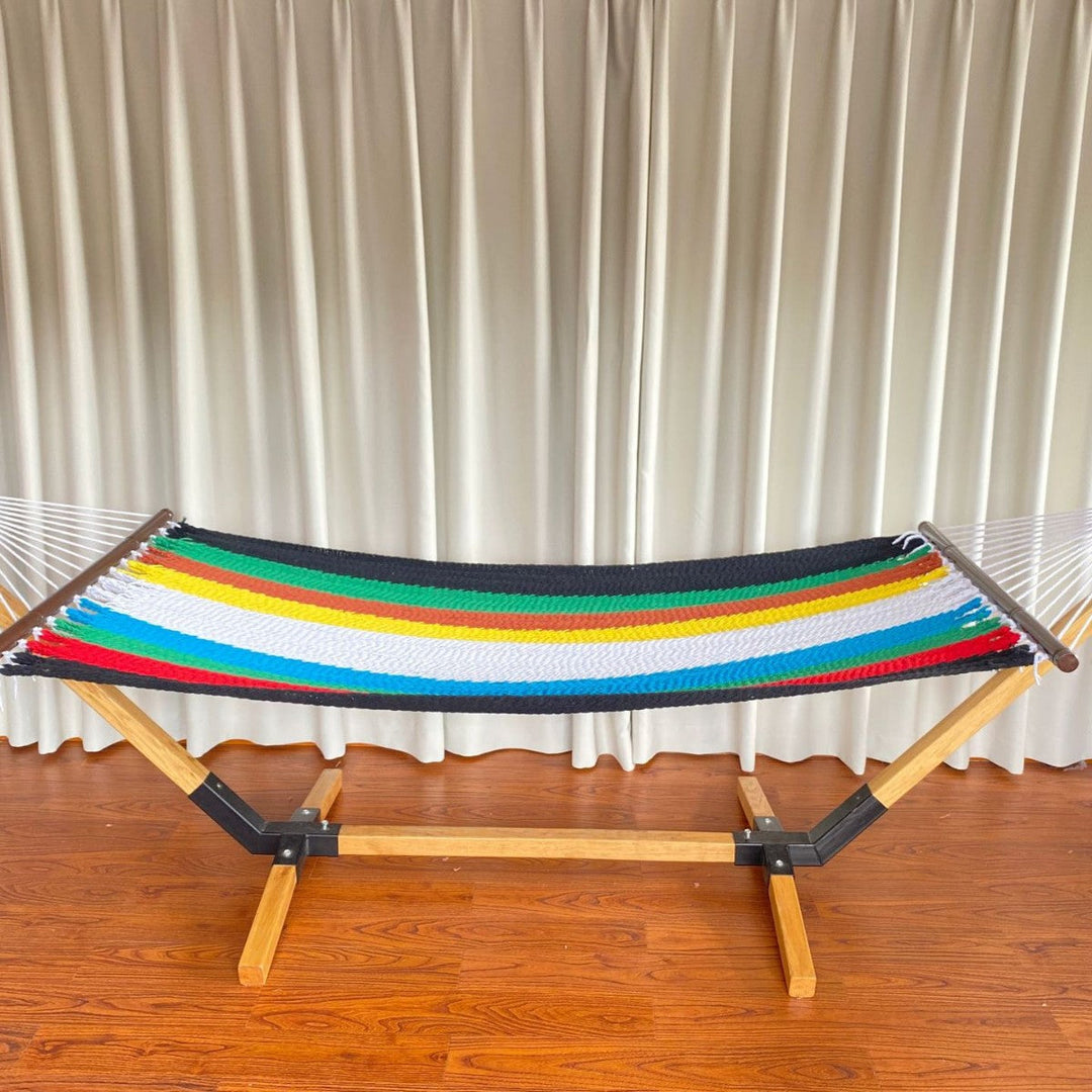 Woven cotton hammock with wooden spreader bars and freestanding stand Kalsten