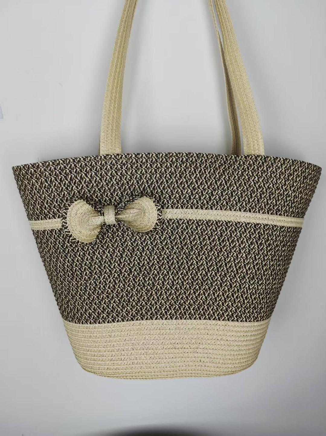 Elegant straw bag with decorative bow closure Kalsten