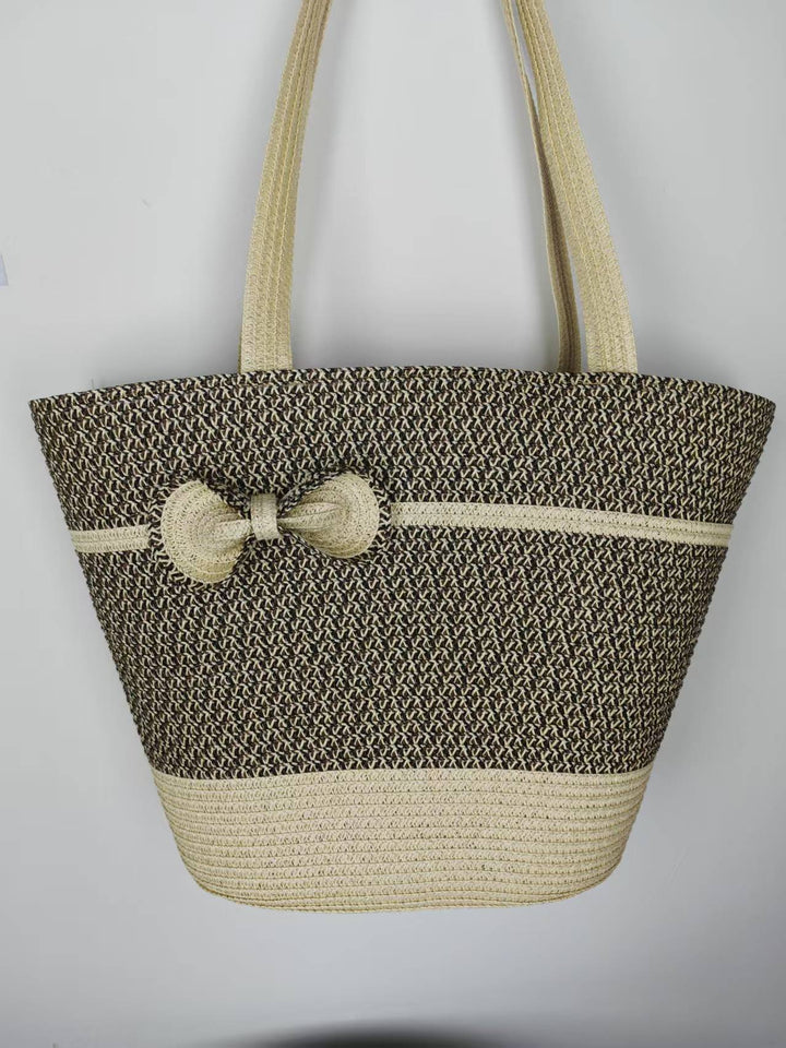 Elegant straw bag with decorative bow closure Kalsten