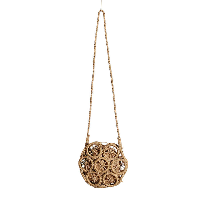 Shoulder bag made of handwoven raffia with intricate embellishments Kalsten