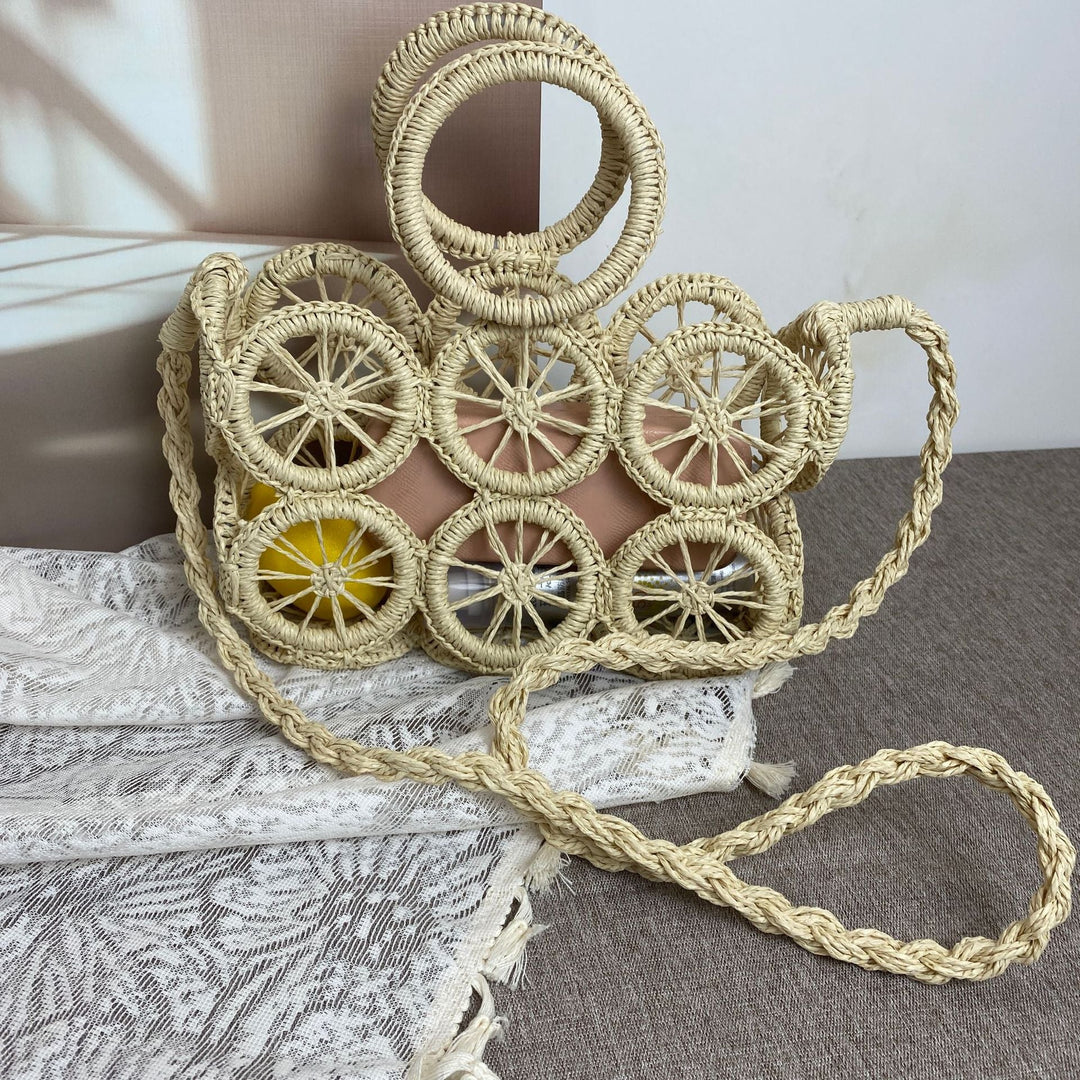 Artisan woven basket bag with striking wheel pattern Kalsten