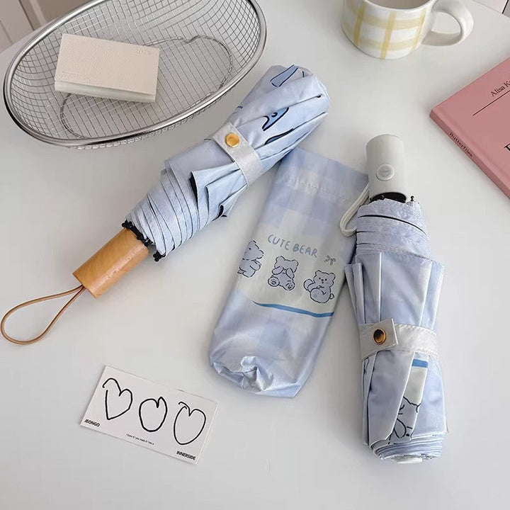 Women's Foldable Umbrella with Playful Checkered Pattern Kalsten