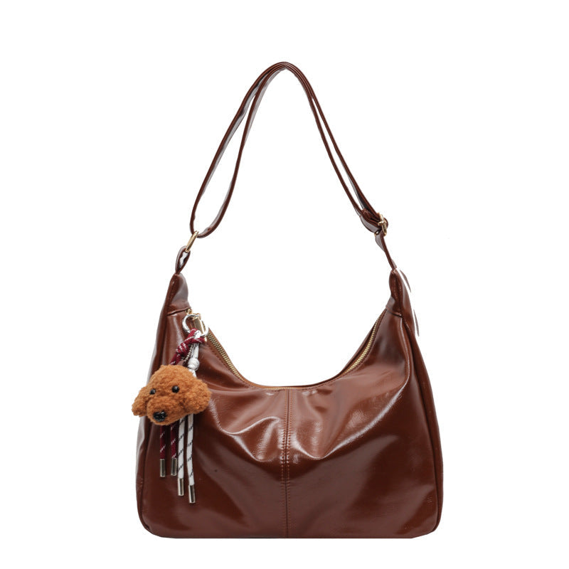 Shoulder bag with charming animal pendant Kalsten