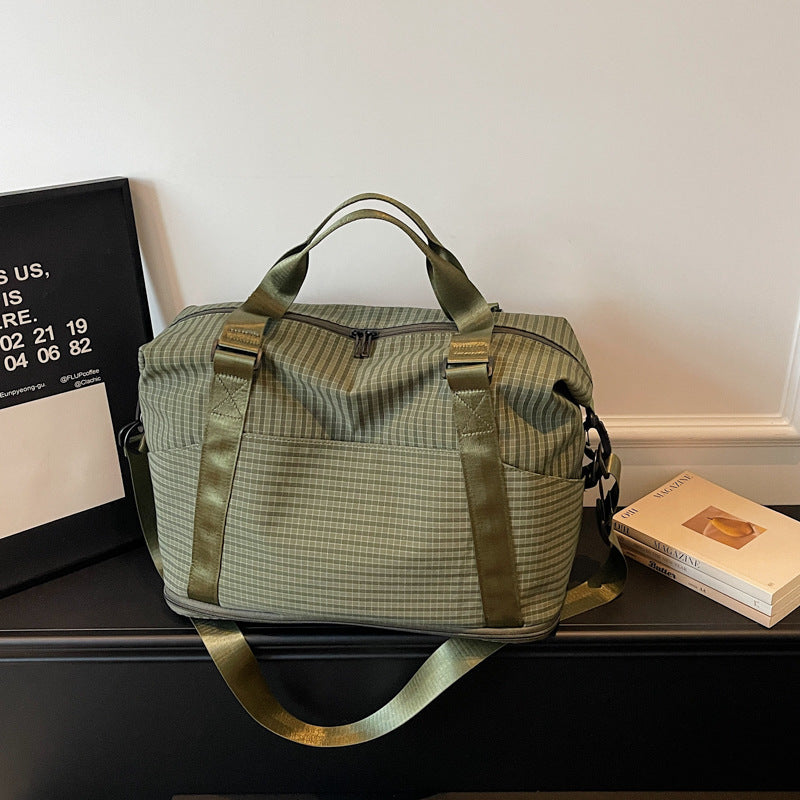Sporty travel bag with practical storage and adjustable shoulder straps Kalsten