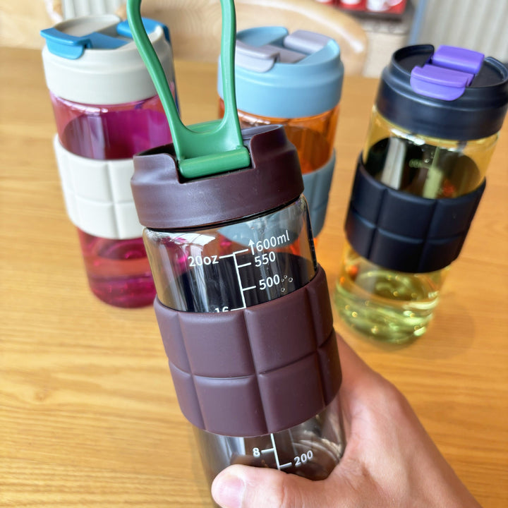 Women's transparent drinking bottle with non-slip silicone coating Kalsten