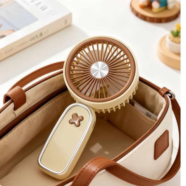 Women portable mini fan with USB charging function and ergonomic design Kalsten