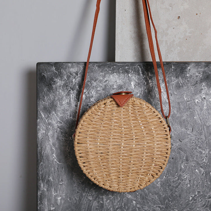 Round basket bag with leather accents Kalsten