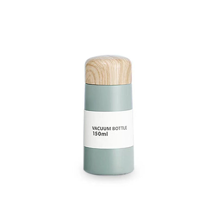 Women vacuum-insulated water bottle with innovative wooden lid Kalsten