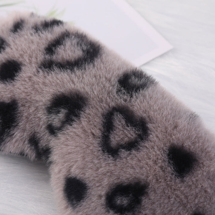 Women's cuddly faux fur sleep mask with heart-embossed surface and gathered comfort band Kalsten
