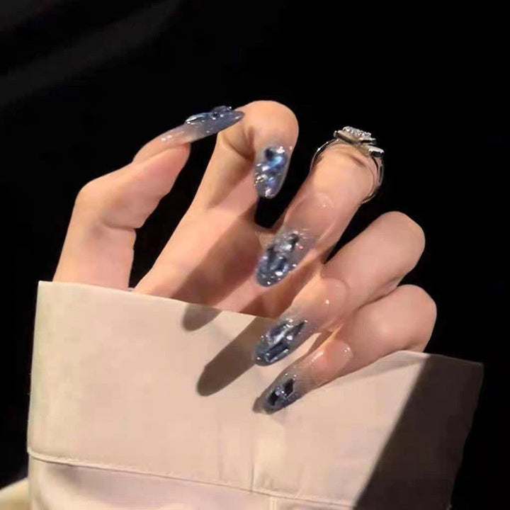 Artificial nails in creative moon and star design Kalsten