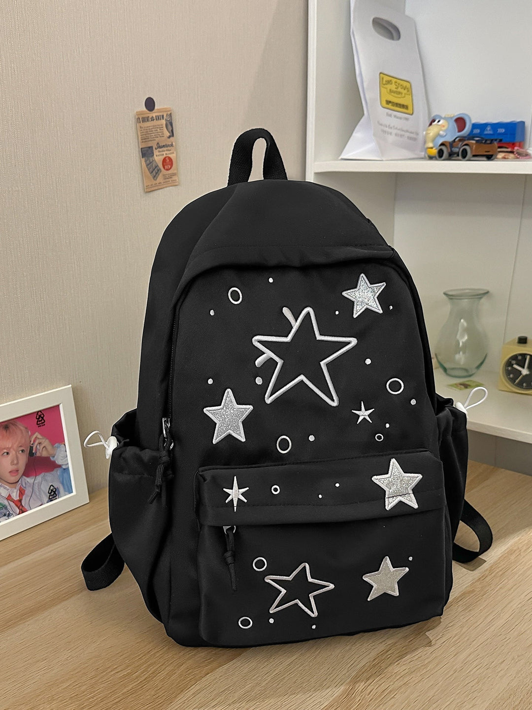 Artistic Star-Embellished School Backpack