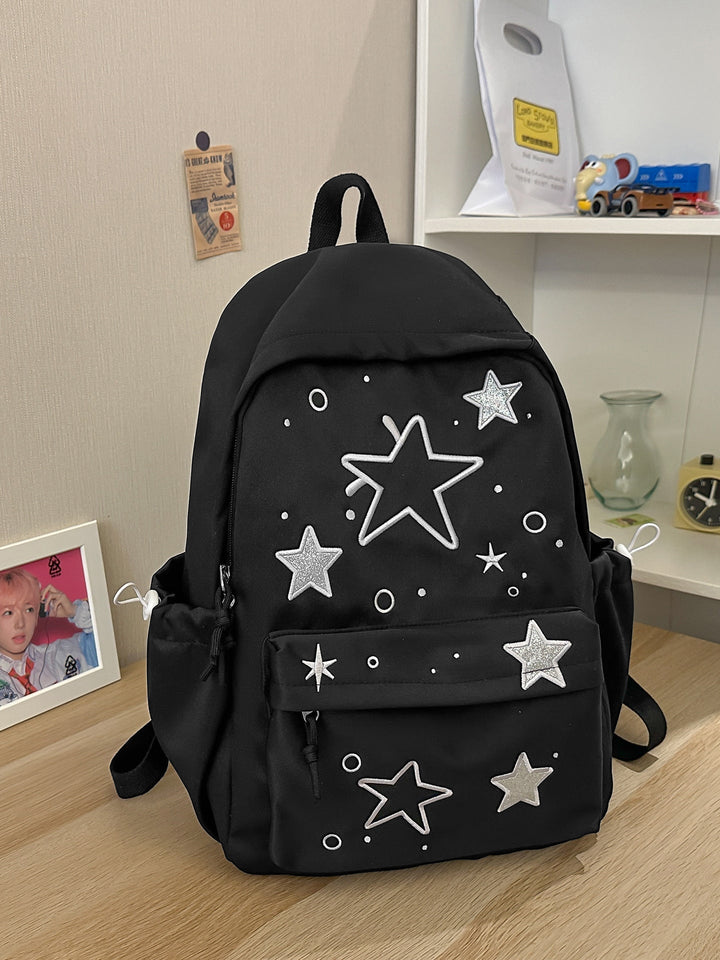 Artistic Star-Embellished School Backpack