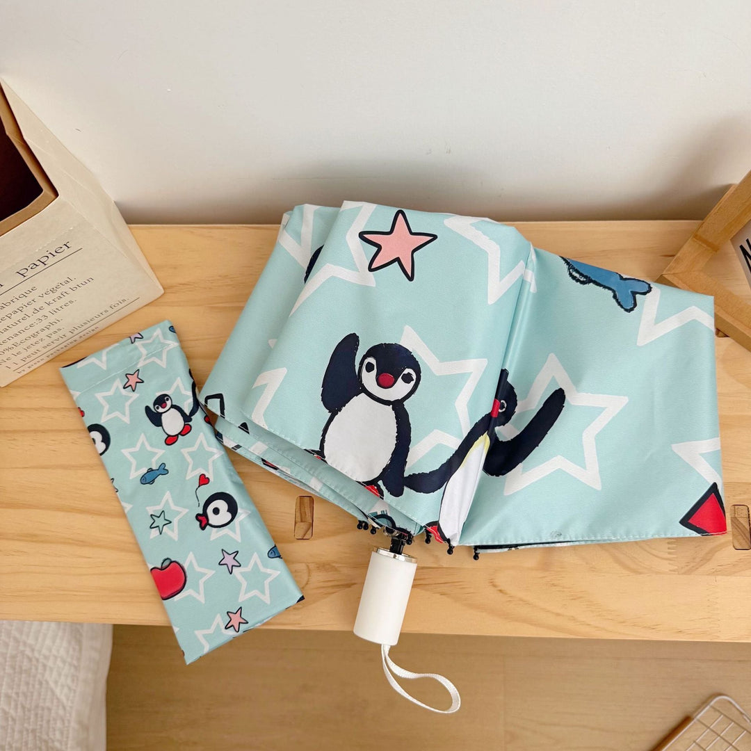 Ladies collapsible umbrella with playful penguin design Kalsten