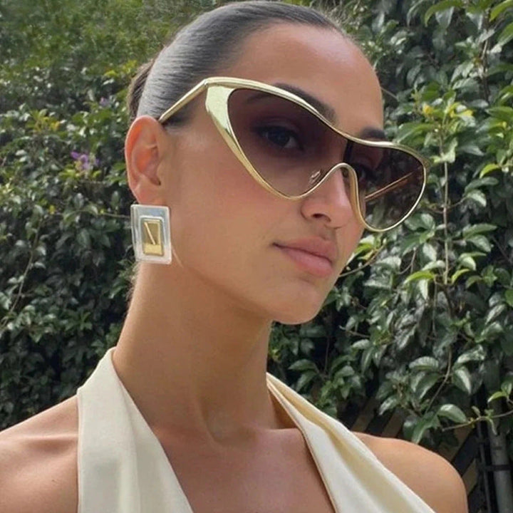 Ladies extravagant shaped sunglasses with protective UV filter Kalsten