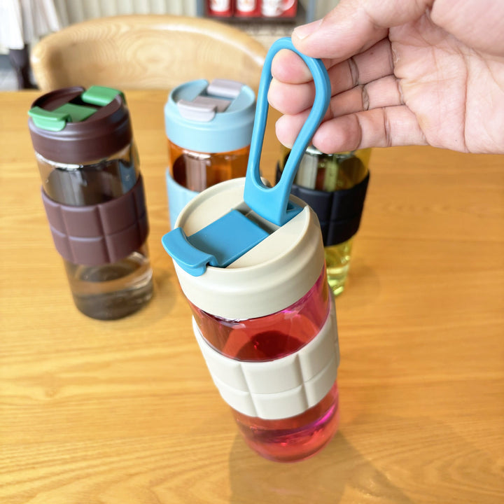 Women's transparent drinking bottle with non-slip silicone coating Kalsten