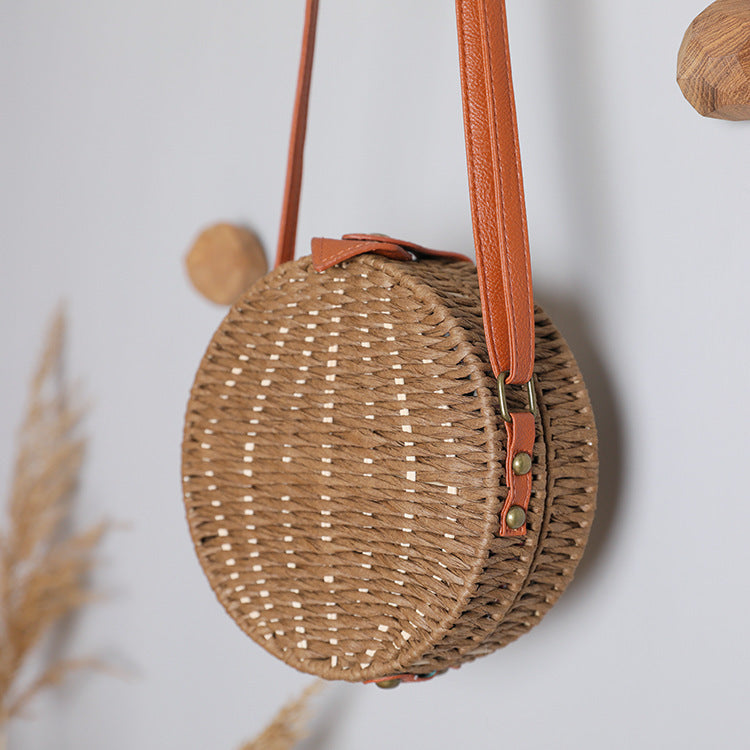 Round basket bag with leather accents Kalsten