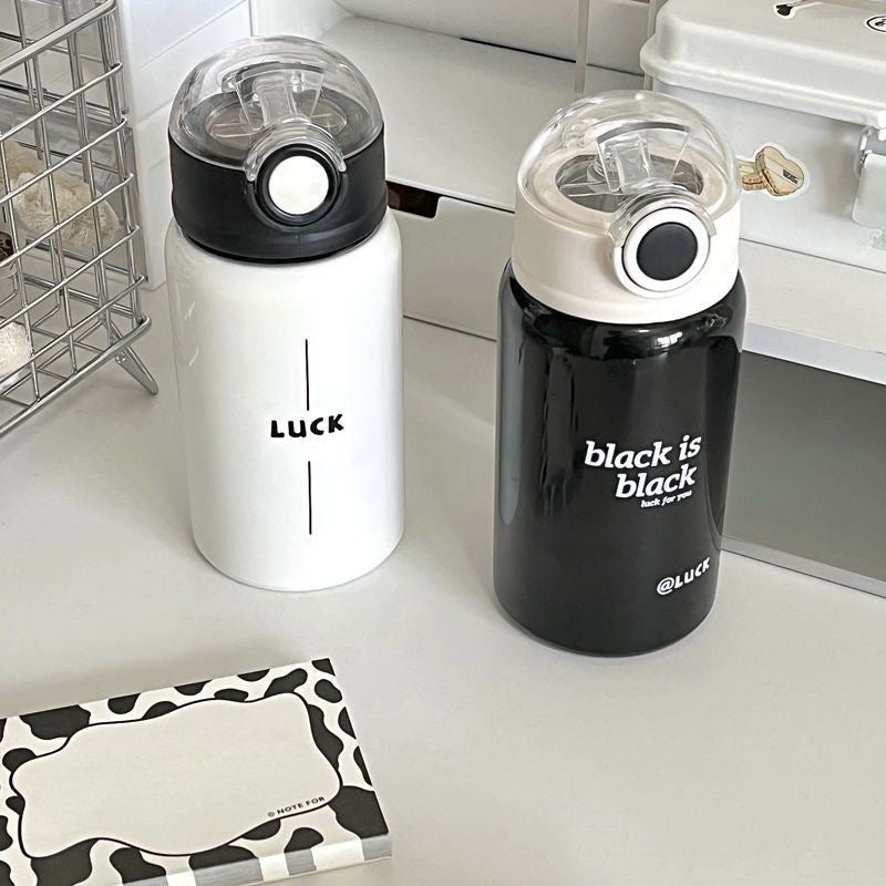 Women's insulated drinking bottle with innovative flip lid and practical handle Kalsten