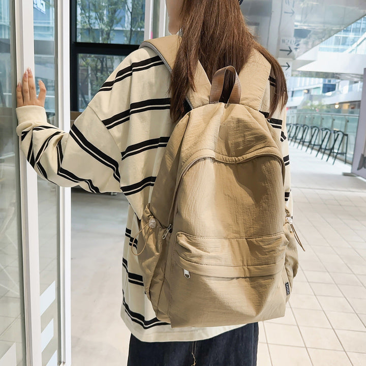 Sporty backpack with practical side pockets Kalsten