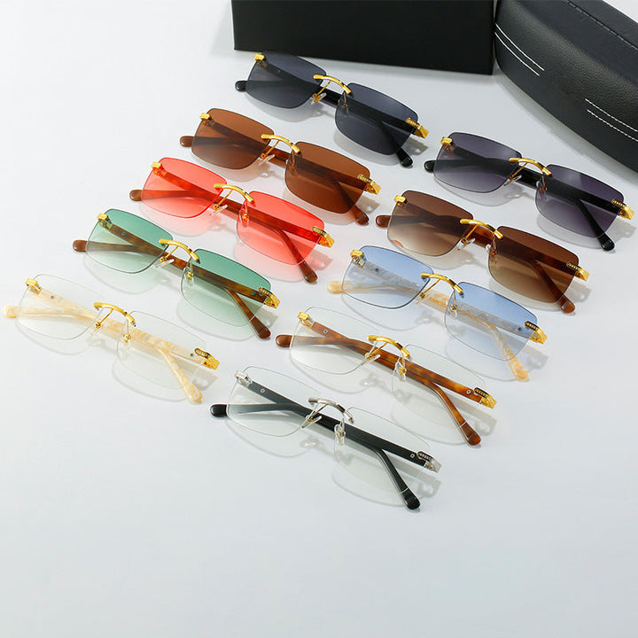 Women's fashionable sunglasses with a stylish, rectangular frame and elegant metal accents Kalsten