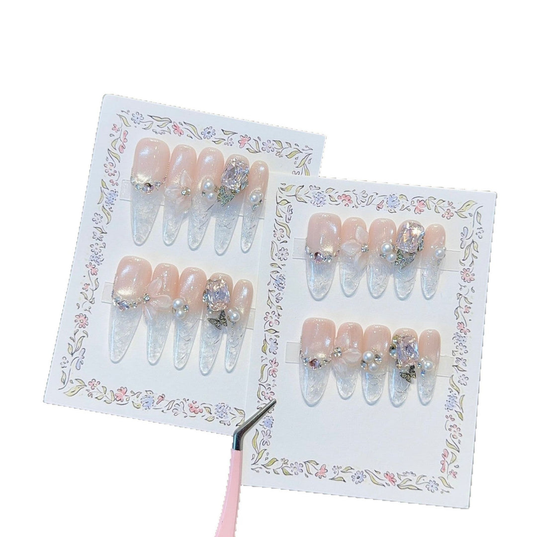 Artificial nails with delicate glitter and pearl decoration Kalsten