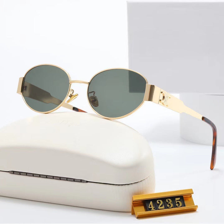 Women elegant oval sunglasses with gold-colored frame Kalsten