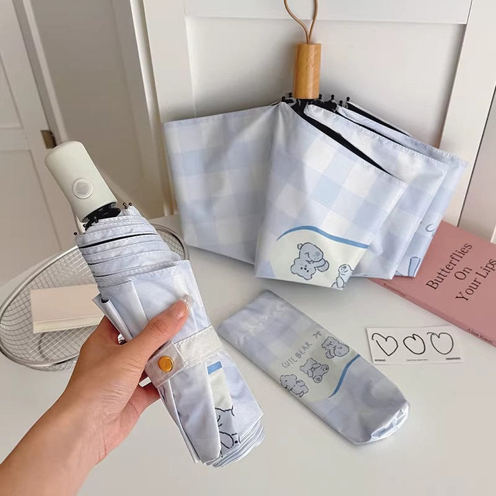 Women's Foldable Umbrella with Playful Checkered Pattern Kalsten