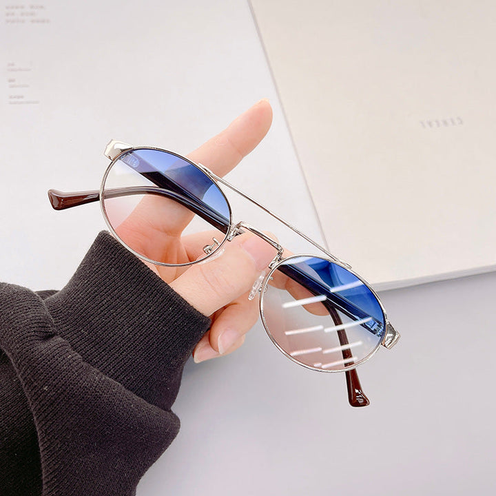Ladies fashionable sunglasses in stylish round design with golden accents Kalsten