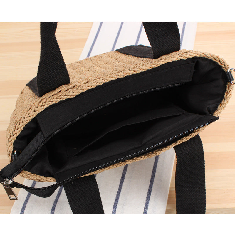 Handbag made of braided natural material with adjustable shoulder strap Kalsten