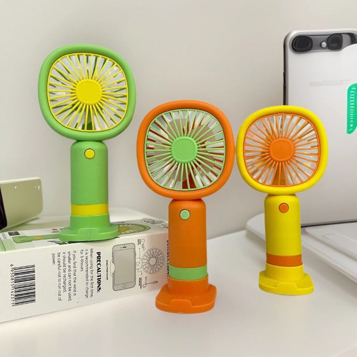 Unisex Handheld Fan with ergonomic design and practical stand function Kalsten