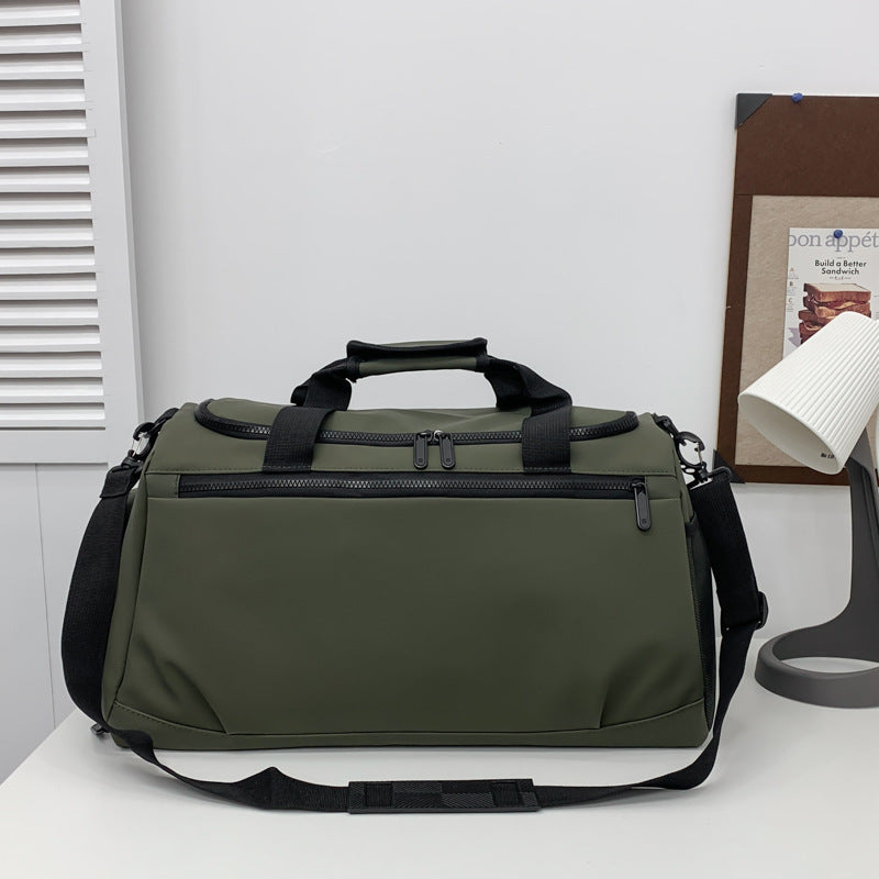 Sporty travel bag with reinforced carrying handles and multiple compartments Kalsten