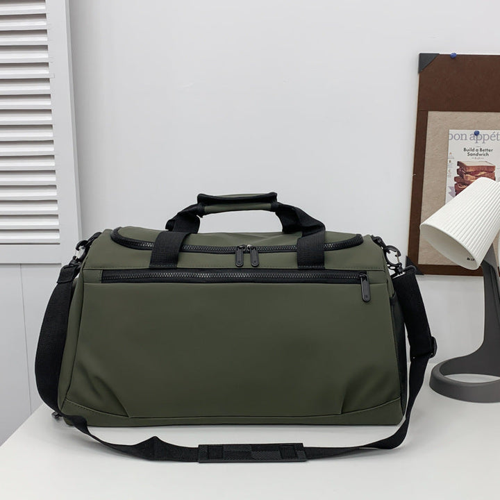 Sporty travel bag with reinforced carrying handles and multiple compartments Kalsten