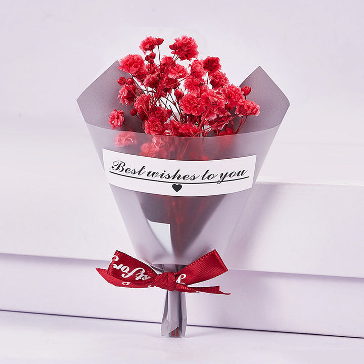 Mini Faux Rose Petal Gift Bouquet With Satin Ribbon Bow And Translucent Cone Wrap