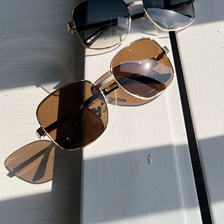 Ladies fashionable angular sunglasses with luxurious golden frame Kalsten