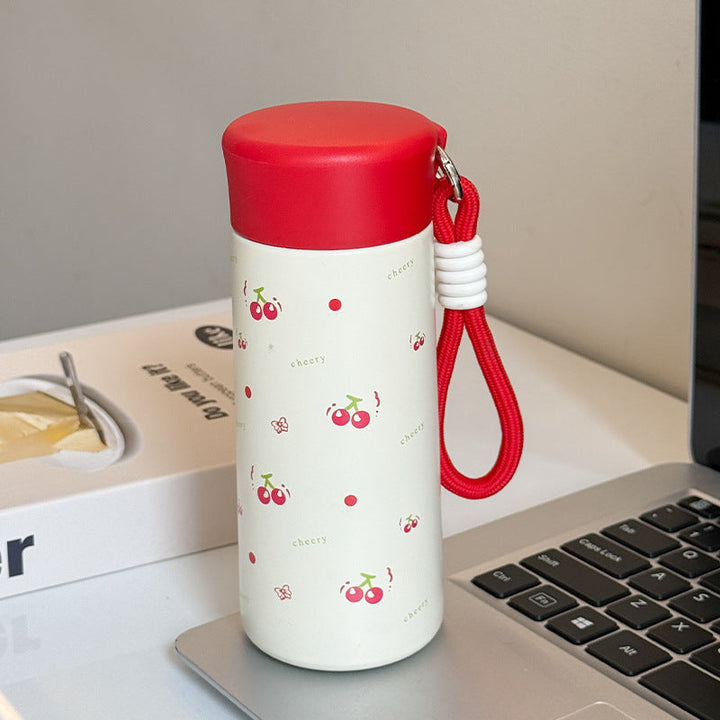 Women’s insulated drinking bottle with practical carrying strap and playful design Kalsten