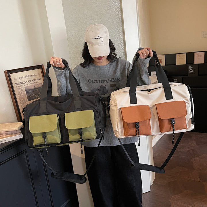 Multifunctional tote bag with comfortable shoulder padding and numerous outer pockets Kalsten