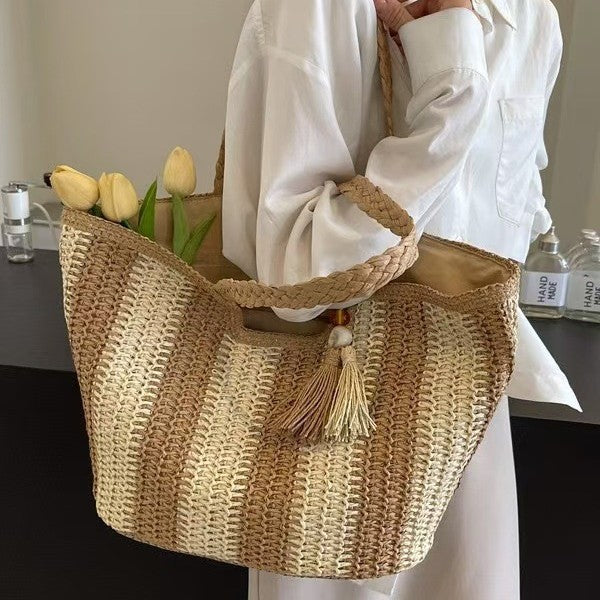 Braided beach bag with decorative tassel pendant Kalsten