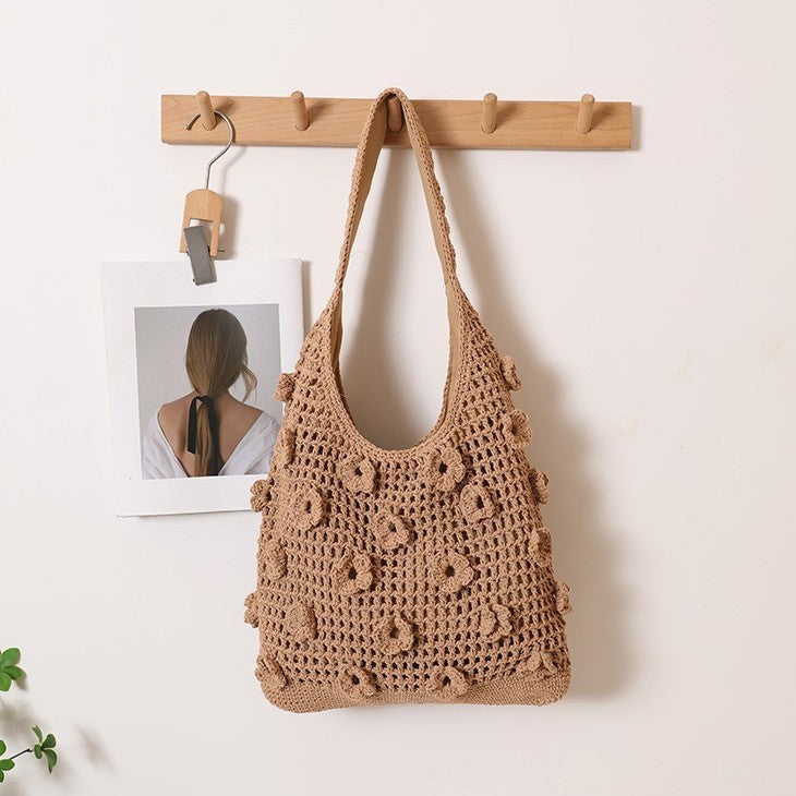 Hand-knotted shoulder bag with floral structural elements Kalsten