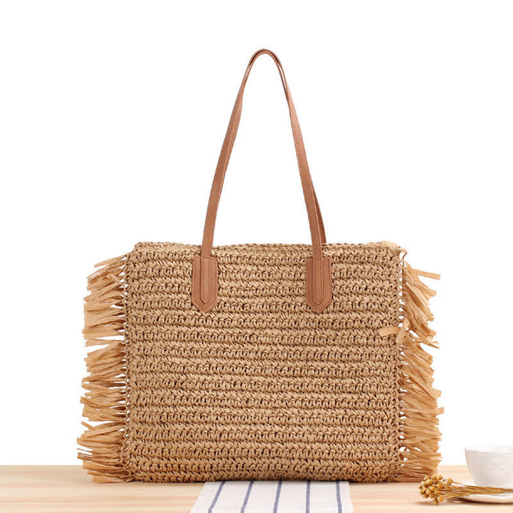 Beach bag with fringes and sturdy leather handles Kalsten