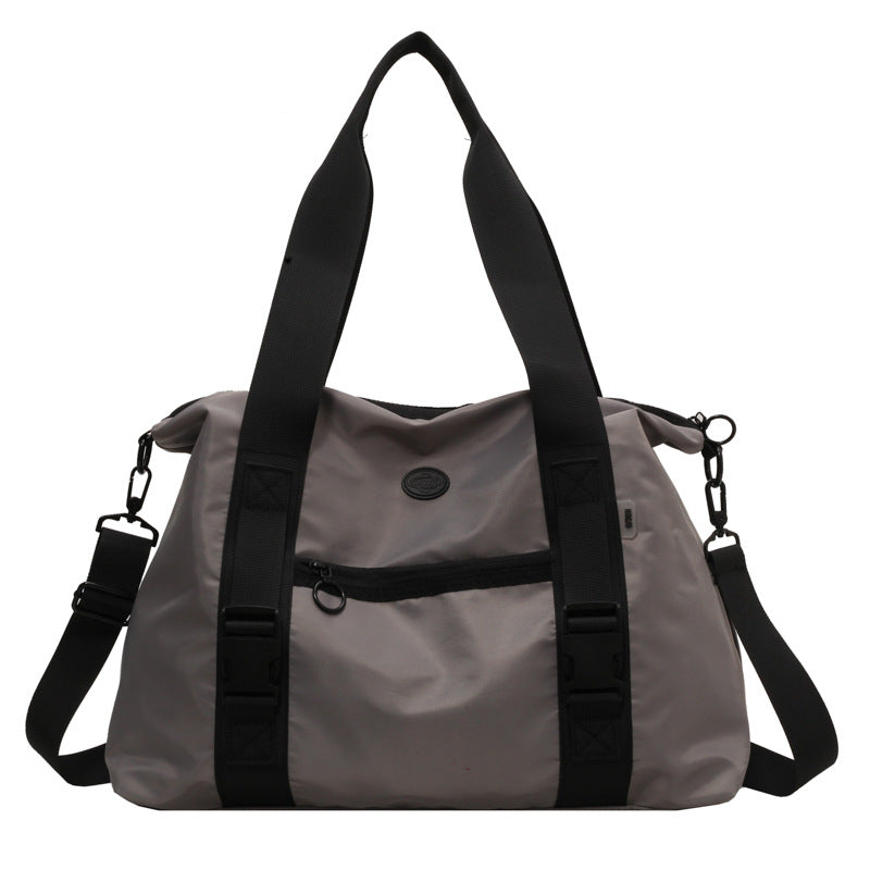Spacious sports duffel bag with ergonomic carrying handles and water-repellent material Kalsten