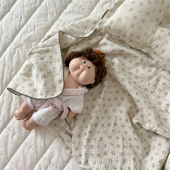 Unisex Muslin Blanket with delicate floral design and elegant ruffles Kalsten