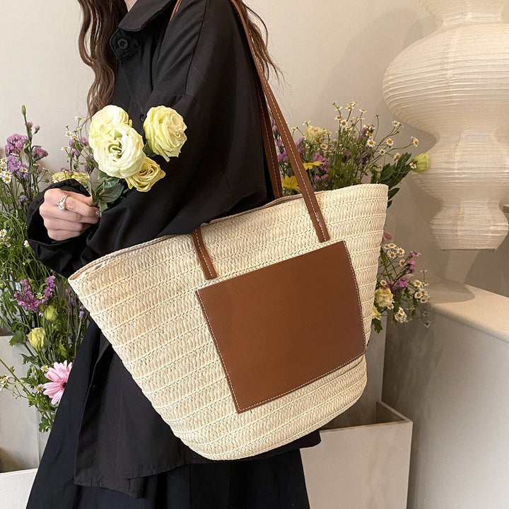 Fashionable straw bag with leather accents Kalsten